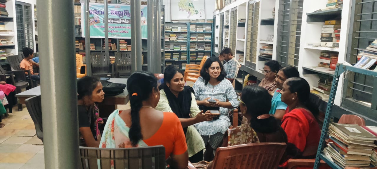Chintha Consultancy engaging with women community members in a local library